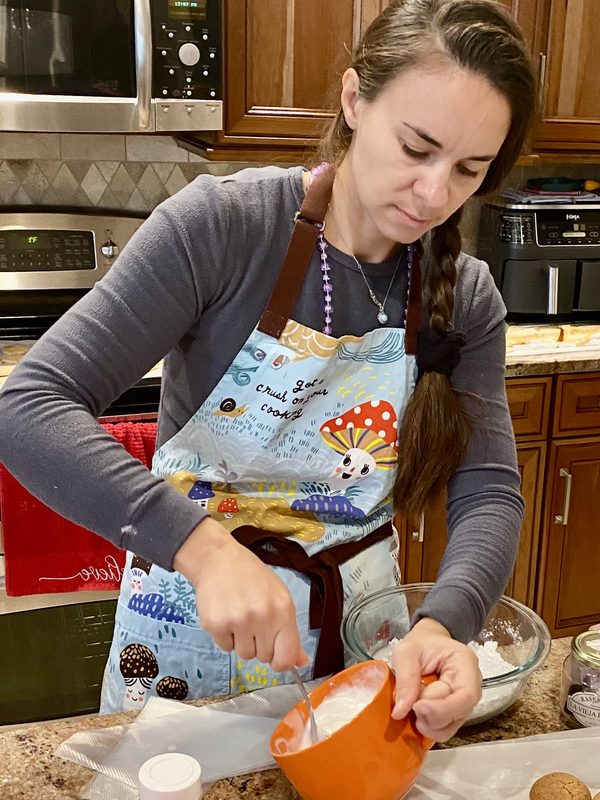 Prepping cakes, baking cookies at Cozy Sweetery