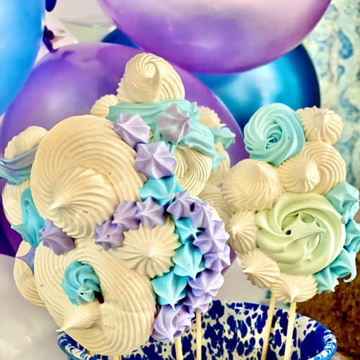Piped meringue pops in custom colors